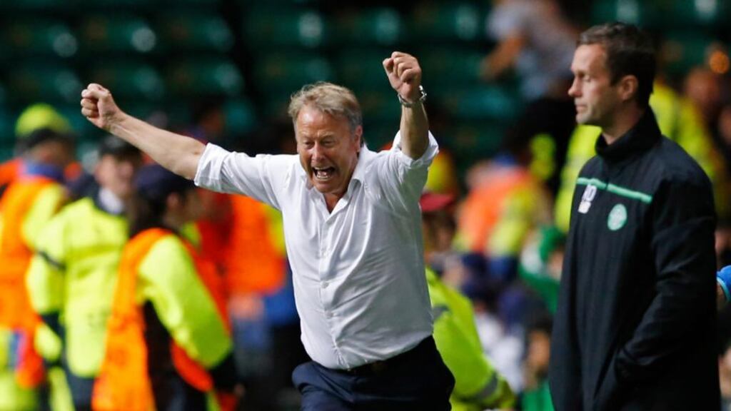 Malmo coach Age Hareide celebrates after Jo Inge Berget scored their second goal at Celtic Park. Photograph: Carl Recine/Reuters