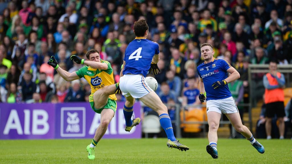 Martin Reilly of Donegal has his shot blocked by Barry Gilleran of Longford during the GAA Football All-Ireland Senior Championship Round 2A match between Donegal and Longford at MacCumhaill Park in Ballybofey. Photo: Oliver McVeigh/Sportsfile via Getty Images