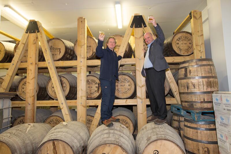Pat Rigney and head distiller Brian Taff, head distiller celebrate the inaugural Drumshanbo whiskey. Photograph: Brian Farrell