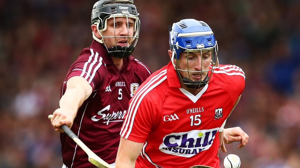 Cork’s Patrick Horgan under pressure from Andrew Smith of Galway during the All-Ireland quarter-final. Photo: Cathal Noonan/Inpho