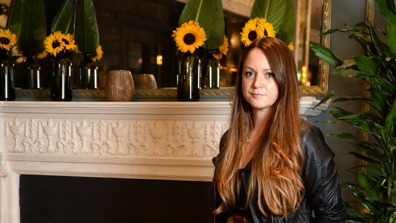 Jill De Burca in a dress which she made into a skirt after buying it in Manhattan from a vintage store. Photograph: Dara Mac Dónaill / The Irish Times