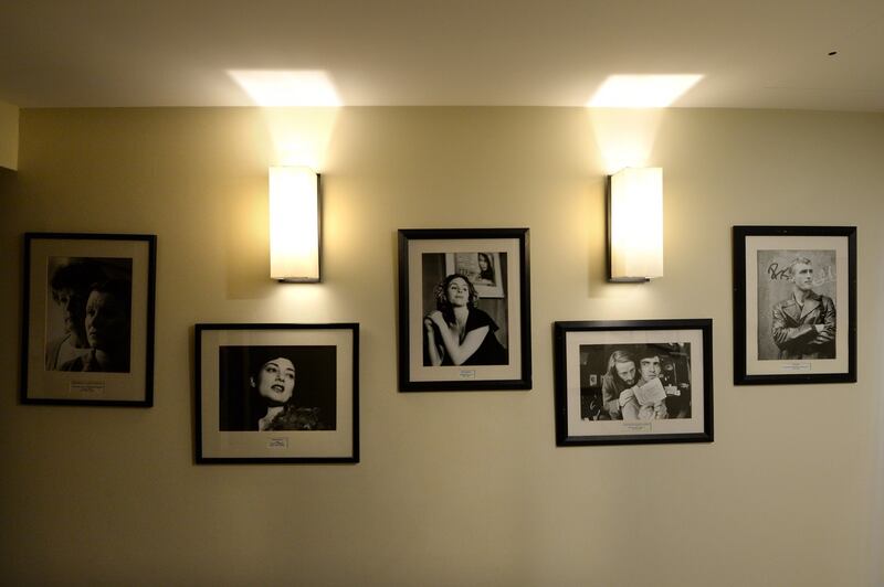 The walls are decorated with photographs of performers and theatre flyers. Photographs: Dara Mac Dónaill/The Irish Times