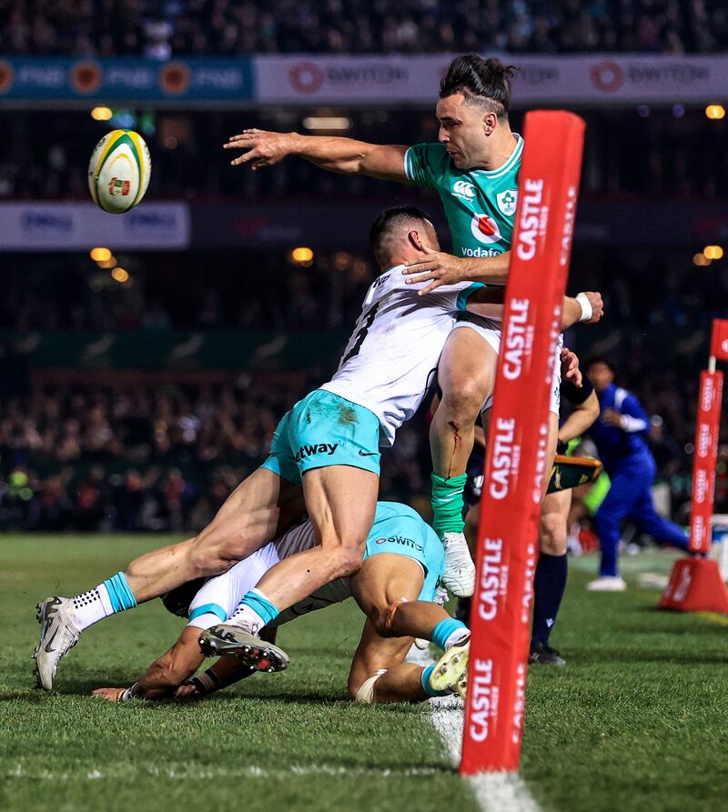 James Lowe keeps the ball in play ahead of Jamie Osborne getting over for an Ireland try. Photograph: Dan Sheridan/Inpho