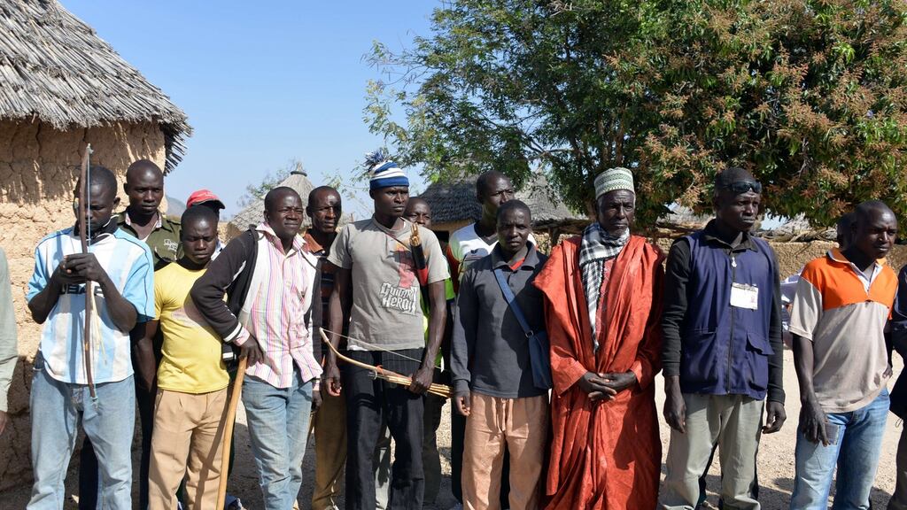 Members of self-appointed vigilance committee hunting down and fighting Boko Haram Islamic group, standing in the village of Lding Lding, northern Cameroon. Photograph: Reinnier Kazer/AFP/Getty Images