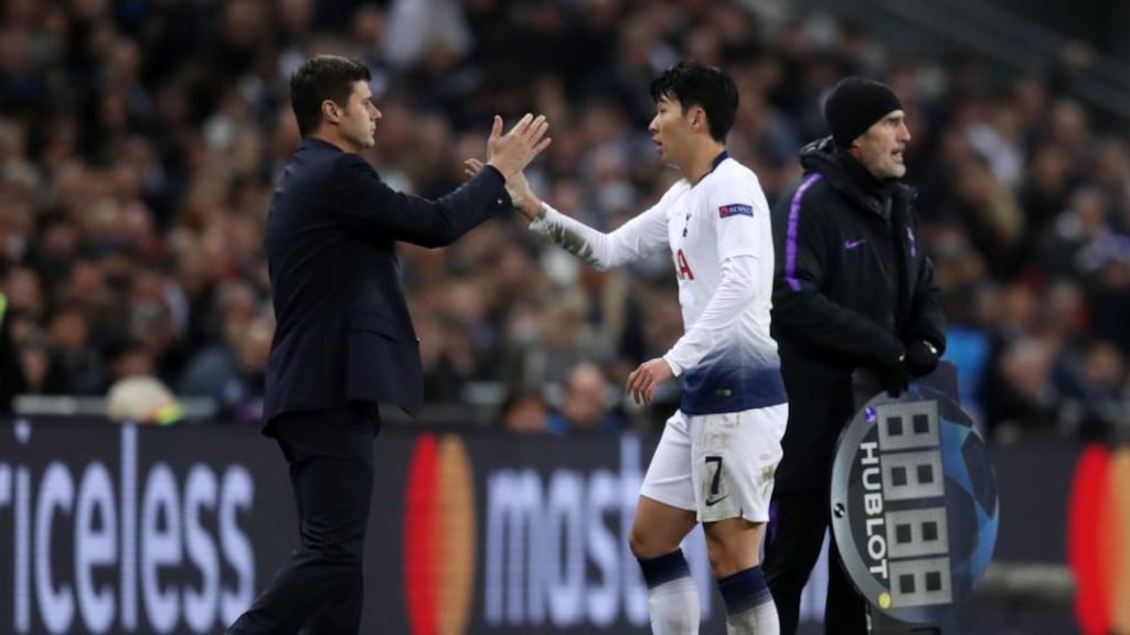 Tottenham Hotspur’s Son Heung-min high fives manager Mauricio Pochettino during the Champions League win over PSV Eindhoven. Photo: Adam Davy/PA Wire