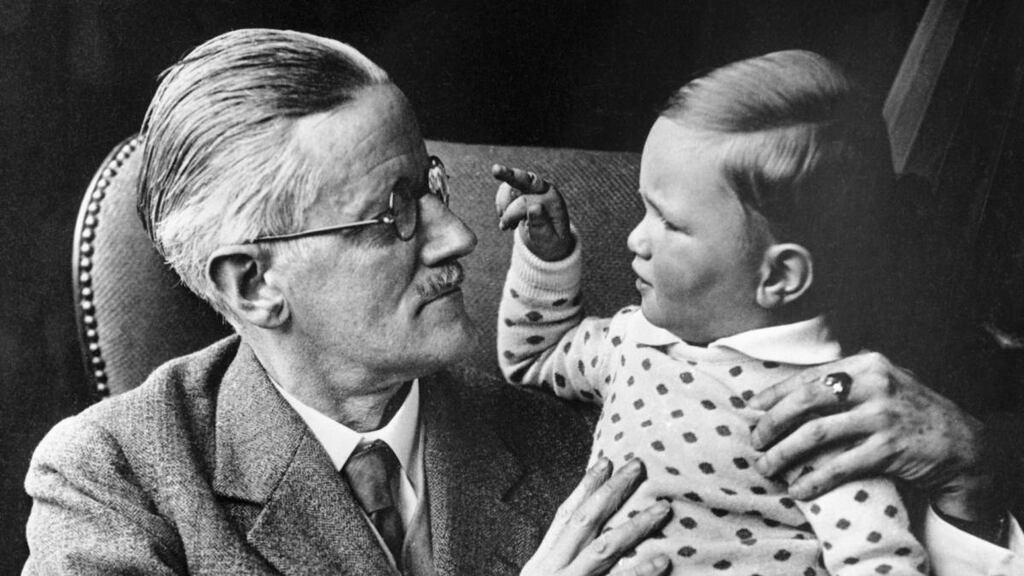 James Joyce with his grandchild Stephen James in 1934. His enduring brilliance includes his unmatched ability to “hear” that musical pulse as it resounds through the everyday lives of ordinary people: