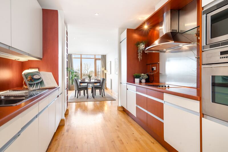 Kitchen with Cherrywood counters and splash backs