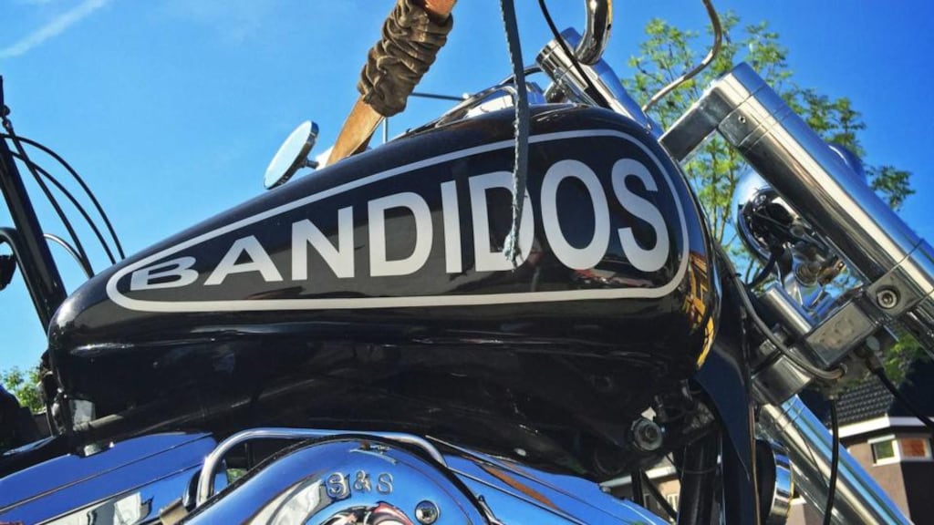 A motorbike is unloaded from a truck after a Dutch police raid in Oirsbeek where two Bandidos members were arrested. Some 400 armed police backed by helicopters targeted 30 locations in Limburg and border regions. Photograph: Henri Haenen