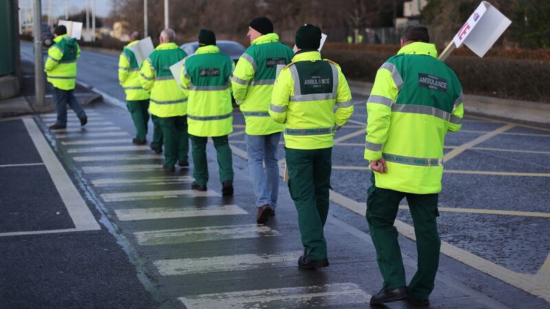 Some of the ambulance staff from the Psychiatric Nurses Association picketing outside an ambulance station on Dublin’s Davitt Road in a dispute over union recognition. Photograph: Niall Carson/PA Wire