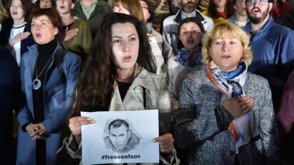 People sing the Ukrainian national anthem during a meeting at the NSC Olimpiysky stadium in Kiev on Monday to demand the release of Ukrainian film director Oleg Sentsov in Russia. Photograph: Genya Savilov/AFP/Getty Images