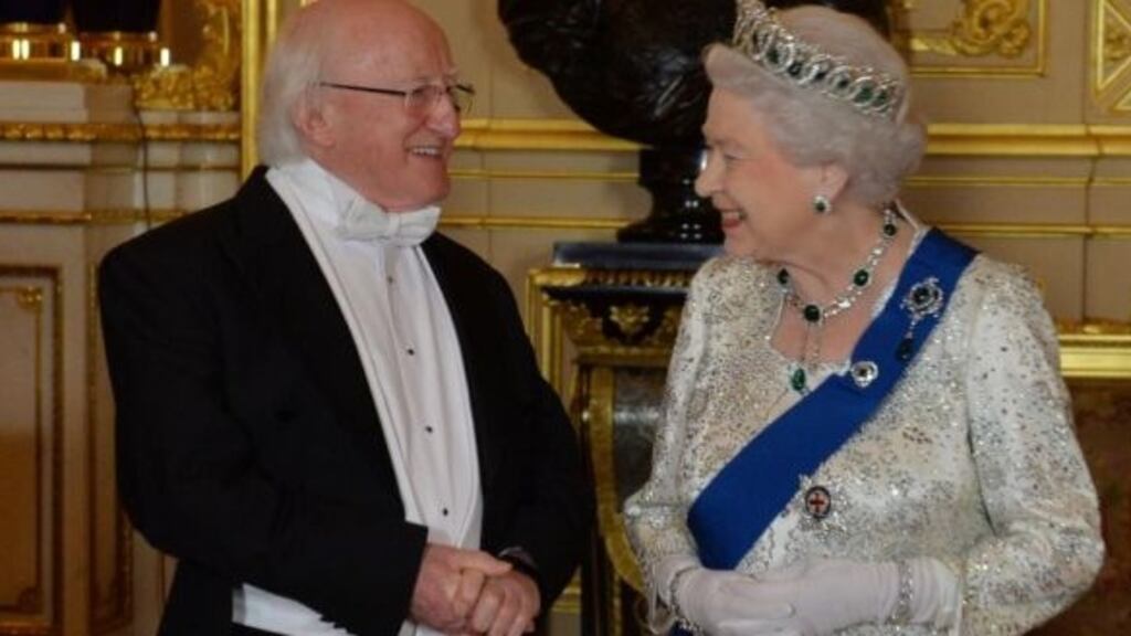 President Michael D Higgins and Queen Elizabeth at a banquet held at Windsor Castle in 2014. Photograph: Alan Betson