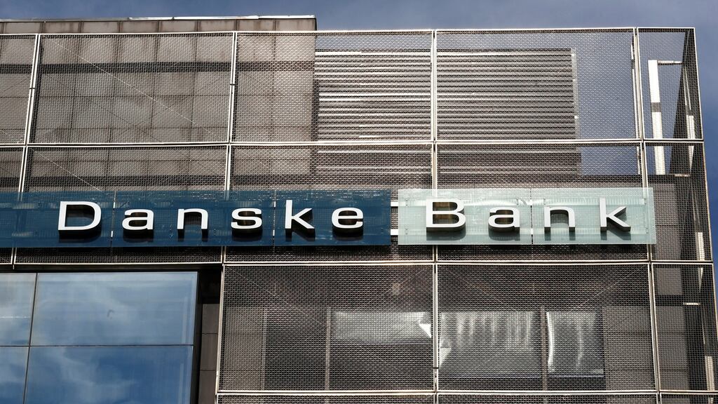 Danske Bank fell 3.4 per cent following the resignation of its chief executive and an update on a money laundering probe that prompted the bank to cut its full-year outlook.