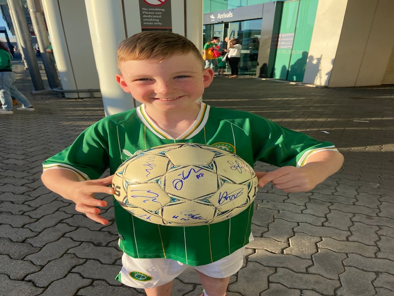 Danny Boland with a signed football. Photograph: Kate McDonald