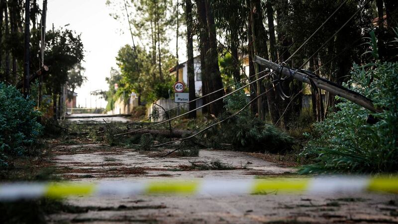 A road is closed after an electric pole fell during storm Leslie. Photograph: Getty