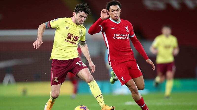 Burnley’s Robbie Brady and Liverpool’s Trent Alexander-Arnold battle for the ball during the Premier League match at Anfield. Photograph: Clive Brunskill/PA Wire