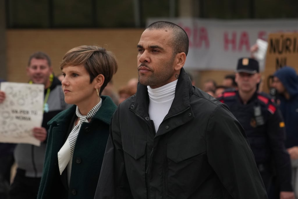 Brazilian football star Dani Alves, right, leaving a penitentiary centre in Sant Esteve Sesrovires, near Barcelona in March 2024. Photograph: Emilio Morenatti/AP