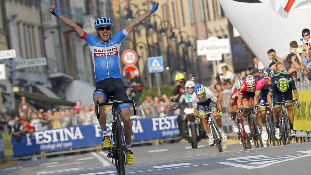Dan Martin celebrates as he crosses the finish line to win the 108th edition of the Giro di Lombardia in October. Photograph:  Luk Benies/AFP/Getty Images