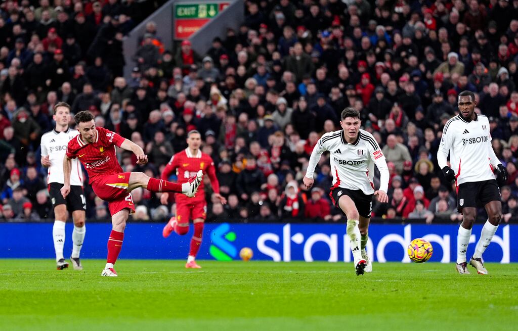 Liverpool's Diogo Jota scores his side's second goal during the Premier League match against Fulham at Anfield. Photograph: Peter Byrne/PA Wire