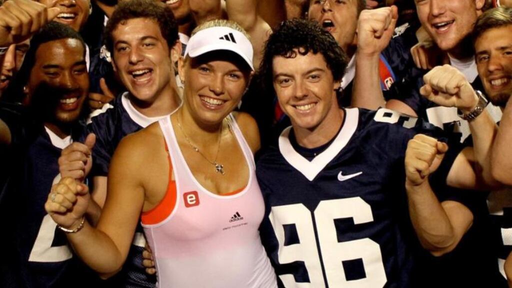 In the thick of it: Wozniacki with McIlroy shortly after they started dating, in 2011. Photograph: Matthew Stockman/Getty