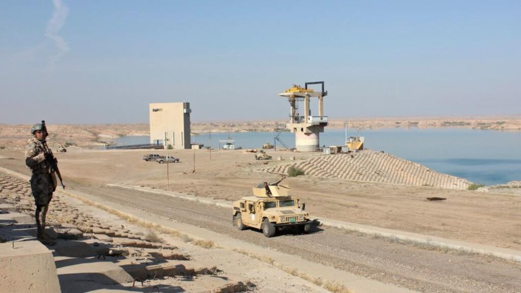 Iraqi security forces in a sweep  against IS militants   north of Baghdad yesterday.   Iraq will need about 80,000  troops to retake the terrain it lost to IS, a top US general said yesterday. Photograph: Reuters