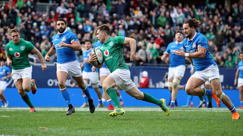 Ireland’s Luke McGrath running in to score his side’s second try at Solider Field, Chicago. Photograph: Dan Sheridan/Inpho