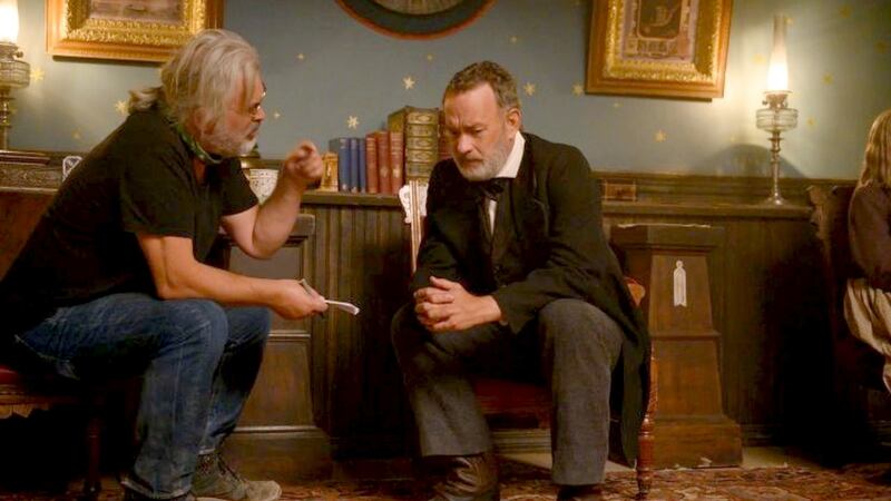 Director Paul Greengrass with Tom Hanks on the set of News of the World. Photograph: Universal Pictures