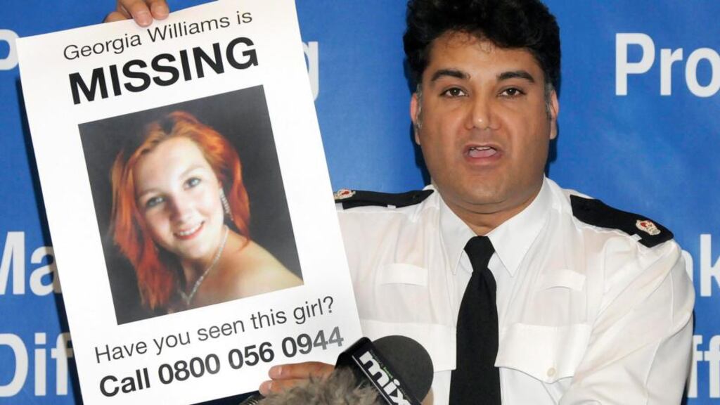 Police superintendent Nav Malik holds up a poster of missing teenager Georgia Williams (17), of Wellington in Shropshire in the west midlands of England. Photograph: PA