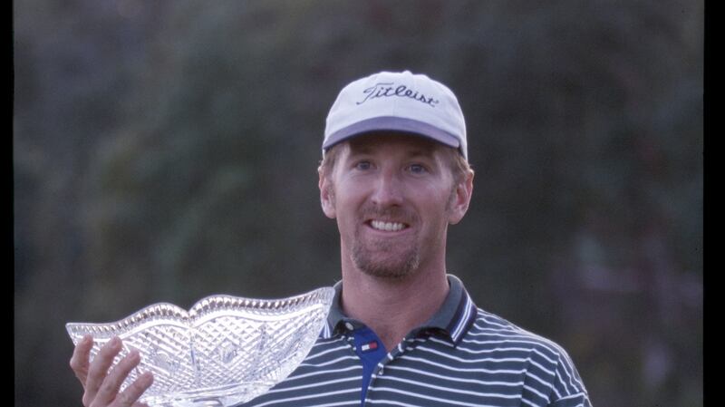 David Duval with the trophy after his breakthrough victory at the 1997 Michelob Championship. Photograph:  PGA Tour archive
