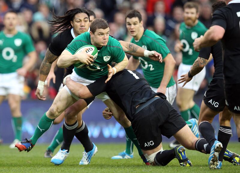 Brian O'Driscoll in action against New Zealand at the Aviva Stadium in 2013. Photograph: Dan Sheridan/Inpho