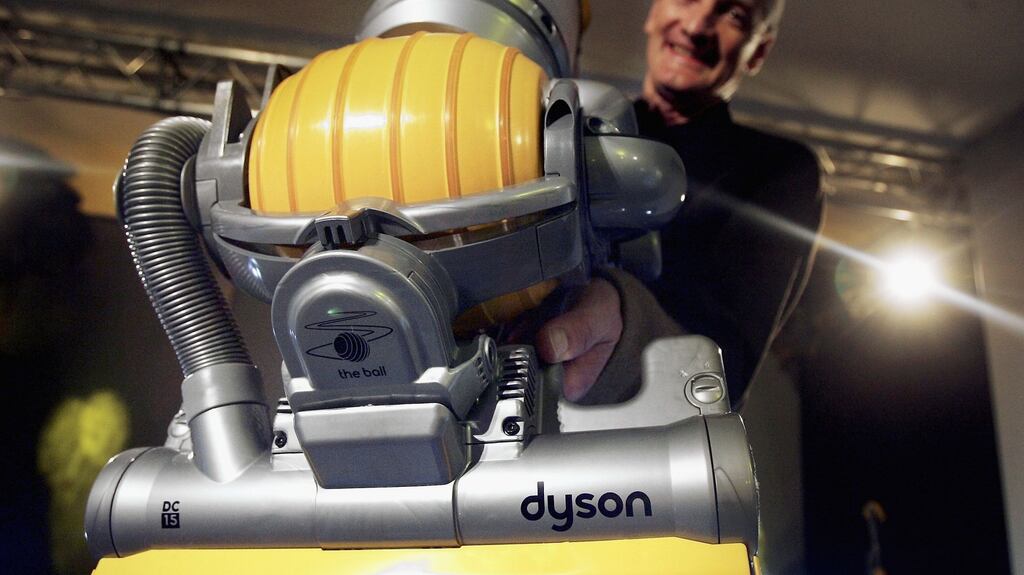 James Dyson with one of his vacuum cleaners. Dyson lost its case over EU energy labelling.