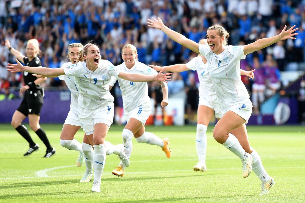 Karolina Lea Vilhjalmsdottir of Iceland celebrates with team-mates after scoring during the Uefa Women's Euro 2022 Group D match  at Manchester City Academy Stadium. Photograph: Harriet Lander/Getty Images