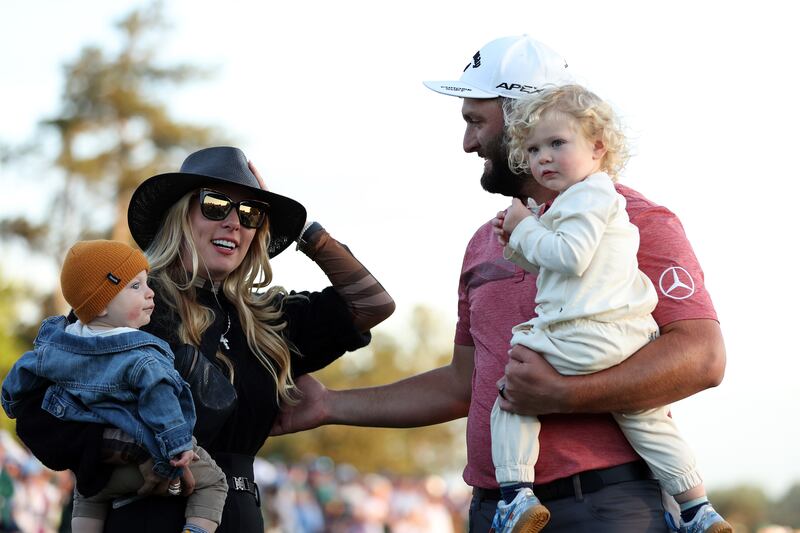 Jon Rahm celebrates with his wife, Kelley, and sons Kepa Cahill Rahm and Eneko Cahill Rahm on the 18th green after winning the 2023 Masters Tournament at Augusta National in Augusta, Georgia. Photograph: Patrick Smith/Getty Images