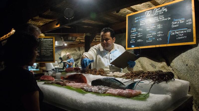 The seafood menu in El Farallo in the Resort at Pedregal in Cabo San Lucas. Rising star Yvan Mucharraz, the executive chef, worked with Thomas Keller and Juan Mari Arzak before moving to the cape. Photograph: Duy Linh Tu for The New York Times