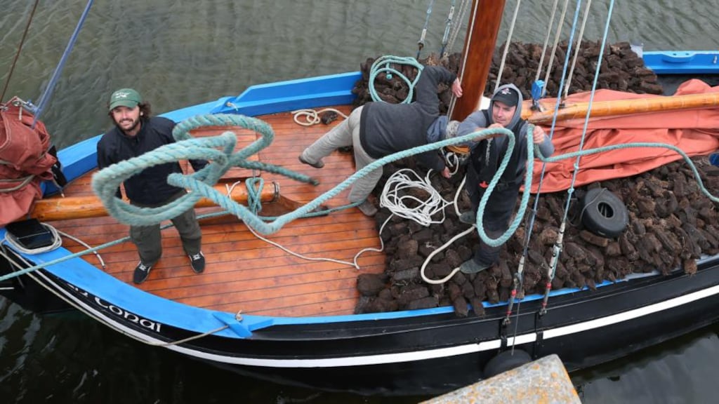 The crew of An Tonaí moor the vessel at Parkmore Pier for the festival. Photograph: Joe O’Shaughnessy