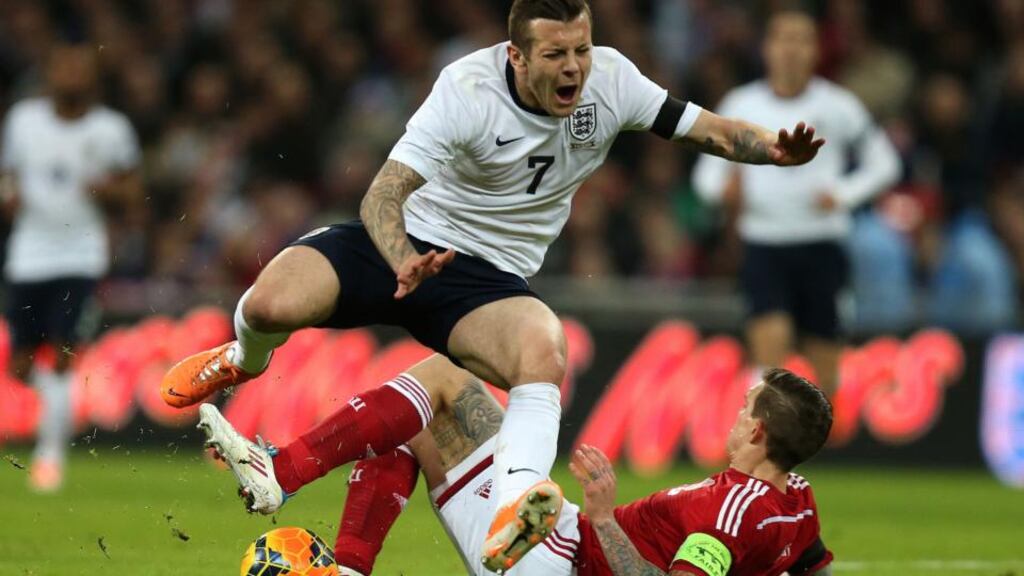 Arsenal midfielder Jack Wilshere has been ruled out for six weeks after suffering a hairline fracture in his left foot during England’s friendly against Denmark. Photograph: Mike Egerton/PA