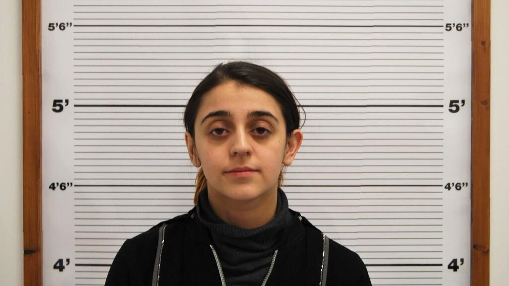 Tareena Shakil as she poses for a custody photograph without a head scarf. Photograph: AFP/ West Midlands Police/ Getty Images