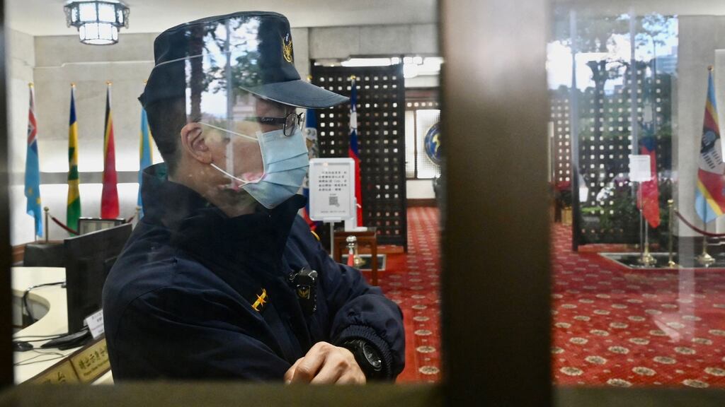 A policeman stands at the entrance of Taiwan’s ministry of foreign affairs building in Taipei. Photograph: Sam Yeh/AFP via Getty Images
