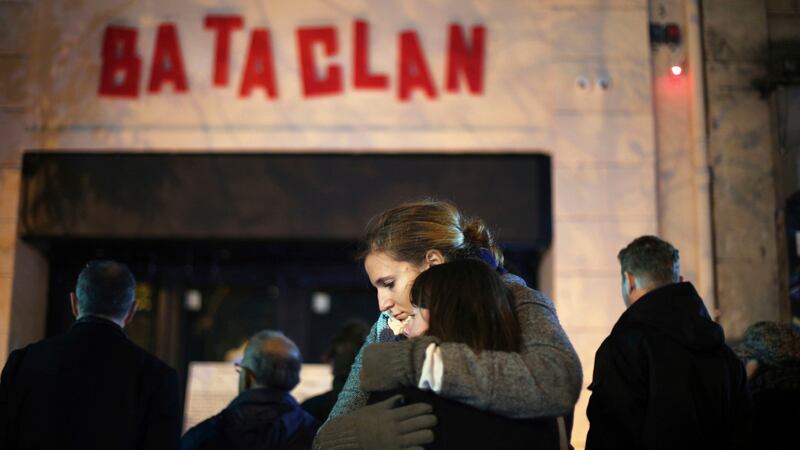 Women hug in front of the Bataclan concert hall in Paris, on November 13th, 2016, one year on from the attacks. Photograph: Thibault Camus/AP Photo