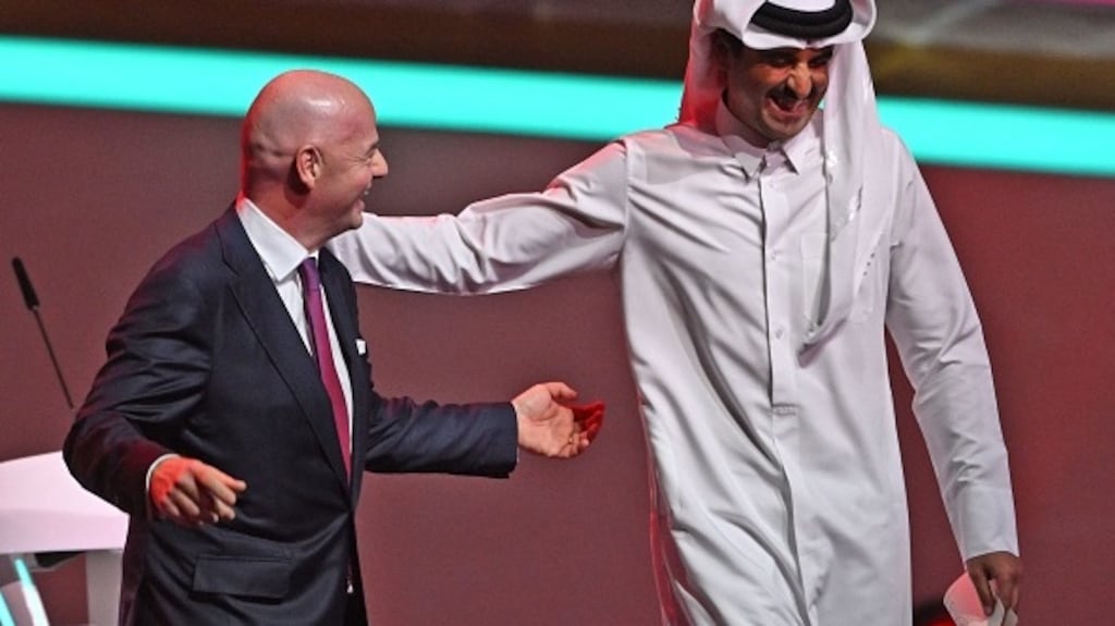Fifa president Gianni Infantino with Qatar’s Emir Sheikh Sheikh Tamim bin Hamad Al Thani at the draw for the 2022 World Cup earlier this month in Doha. Photograph: Getty Images