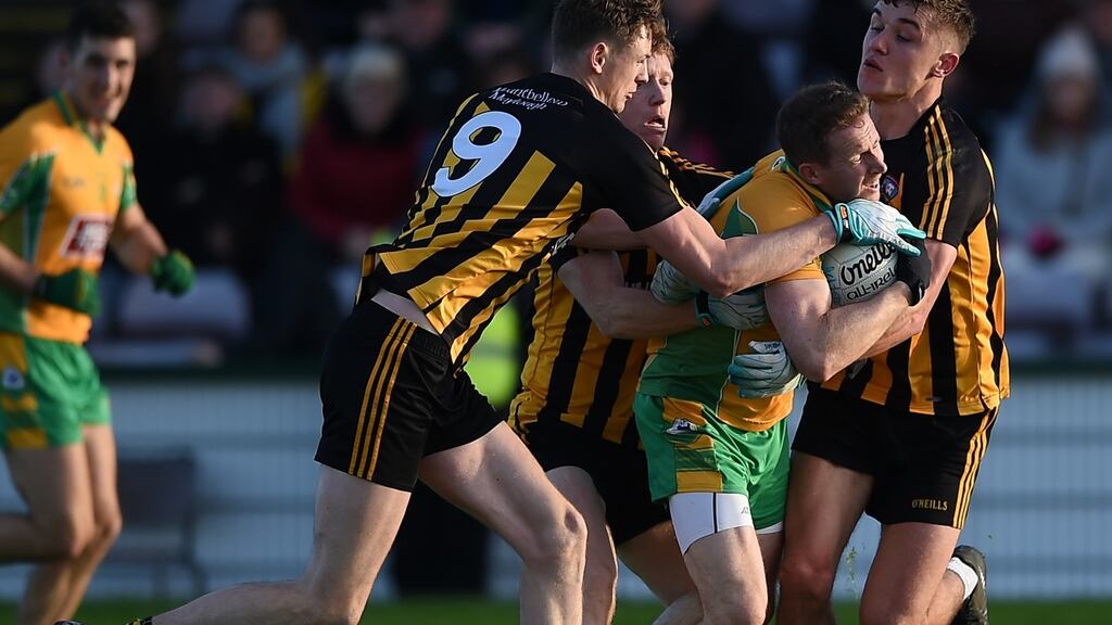 Corofin’s Gary Sice with Michael Daly and Matthew Barrett of Mountbellew/Moylough. Photograph: Tommy Grealy/Inpho