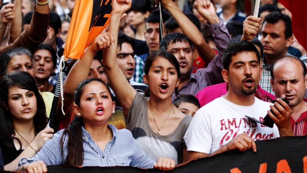 Protesters shout slogans against Turkey’s Prime Minister Tayyip Erdogan as they march during a demonstration against the Turkish government’s foreign policy on Syria, in central Hatay on May 12th, 2013.