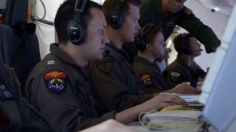 US navy officers search for the ARA San Juan submarine missing at sea over the South Atlantic Ocean on Wednesday. Photograph:  Magali Cervantes/Reuters