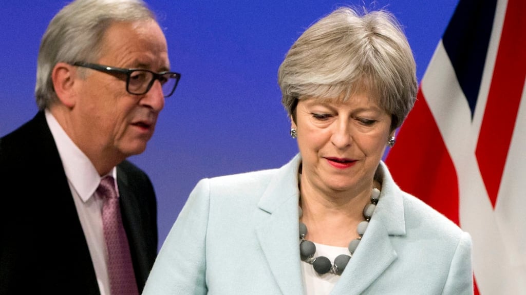 British prime minister Theresa May and European Commission president Jean-Claude Juncker address a media conference at EU headquarters in Brussels on Friday morning. Photograph: AP