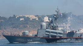 Ukraine claims strikes on Russian warship and airbase in occupied Crimea