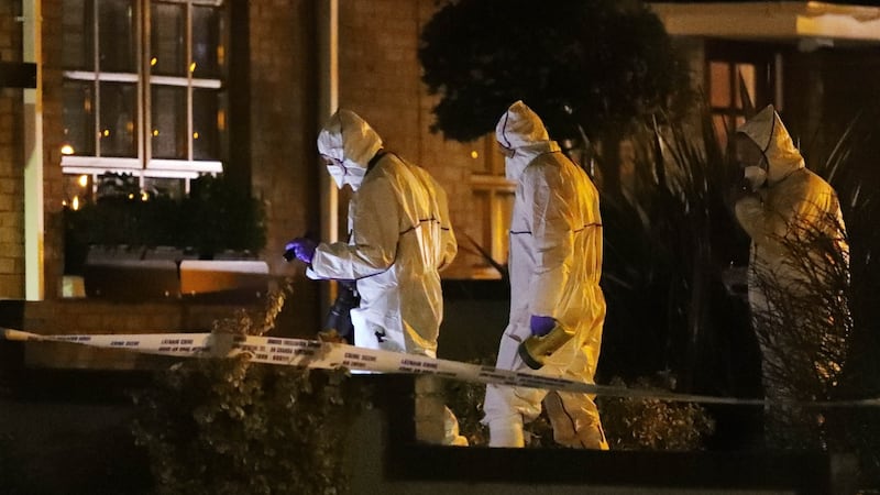 Gardaí at the house on the Clonmore estate in Ardee, Co Louth, where the body of a woman was found. Photograph: Colin Keegan/Collins