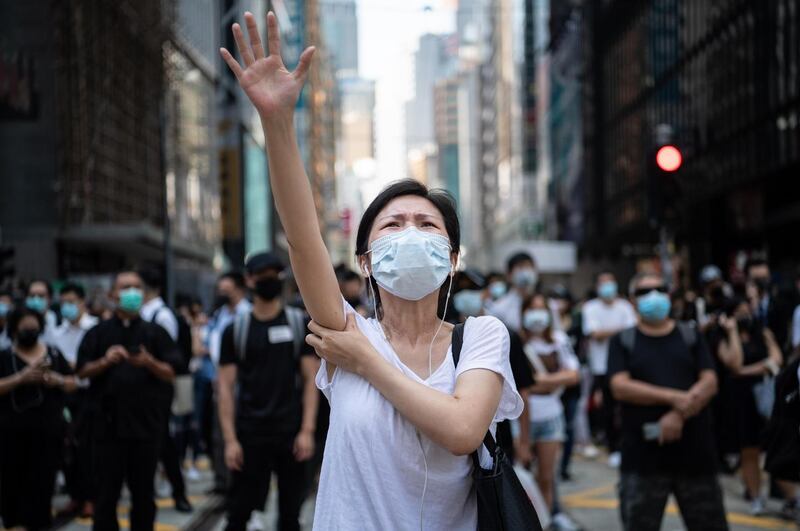 People protest a government ban on face masks in Hong Kong on Friday. Photograph: Laurel Chor/Getty