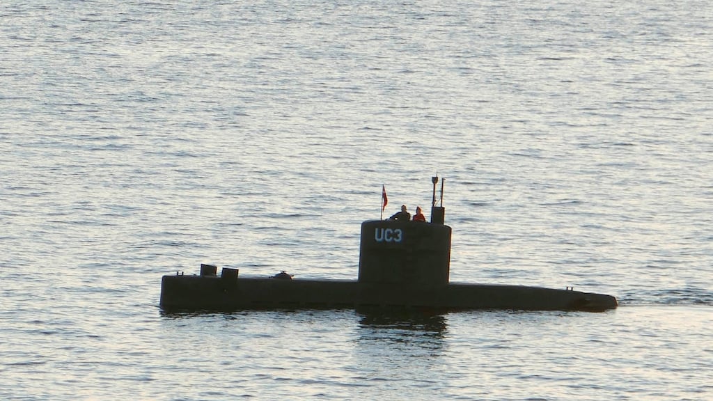 A man and a woman standing in the tower of Peter Madsen’s private submarine UC3 Nautilus in Copenhagen Harbor in August. Photograph: Getty Images