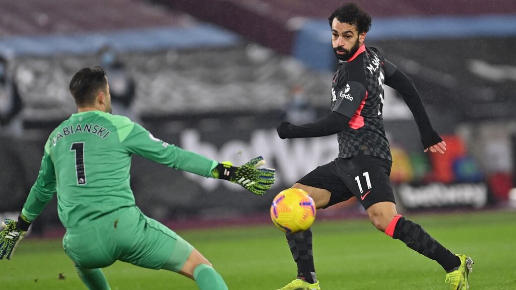 Liverpool’s Mohamed Salah scoring his team’s second goal against West Ham in London. Photograph: EPA/Justin Setterfield