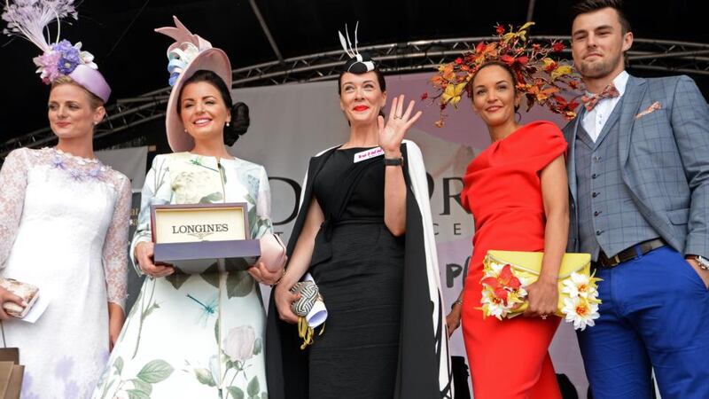 Best dressed winner Laura Jayne Halton  with (from left) most creative hat winner Linda Morrison, Longines Elegance is an Attitude winner Sarah Cass, most colourful outfit  winner Linda Malone and  best dressed man Cormac Bates, on Ladies’ Day at the Dublin Horse show in the RDS. Photograph: Eric Luke/The Irish Times