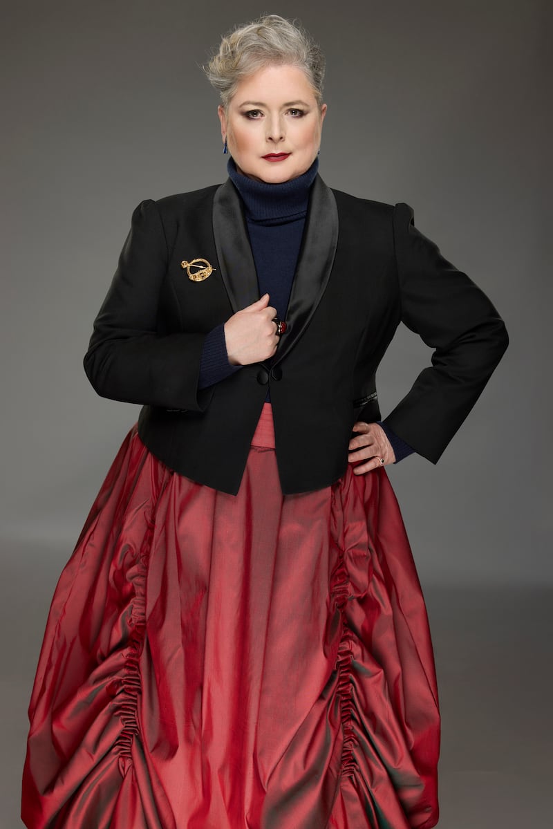 Siobhan McSweeney wearing a bolero-style tuxedo (her own), navy jumper from M&S, silk taffeta skirt by Orla Langan, and Tara brooch from Delphi Antiques